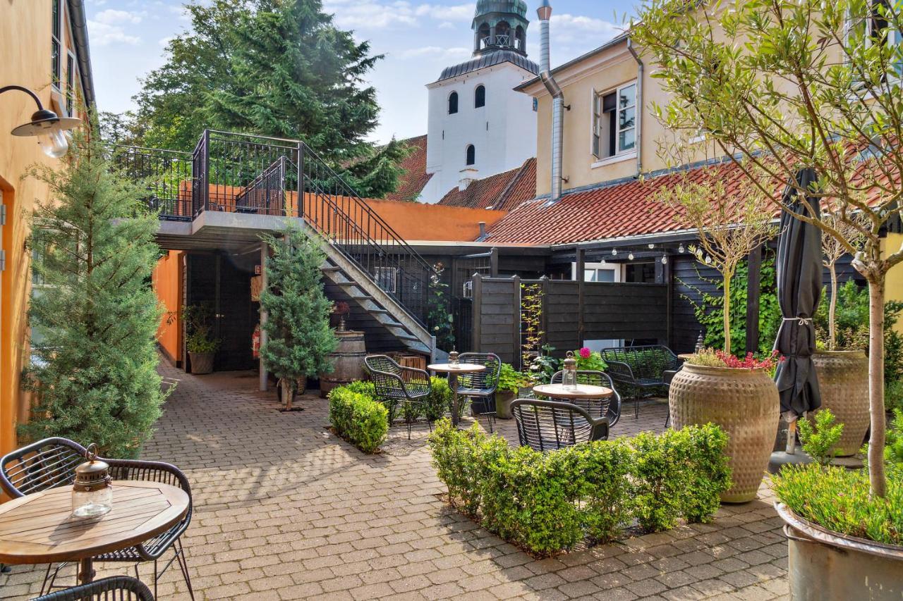 Hotel Pa Torvet Эрёскёбинг Экстерьер фото